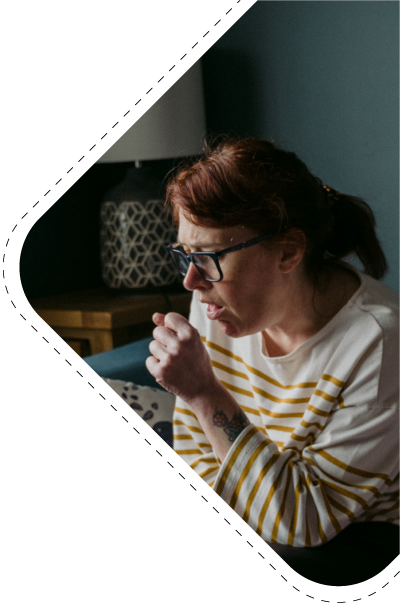 Image of woman coughing