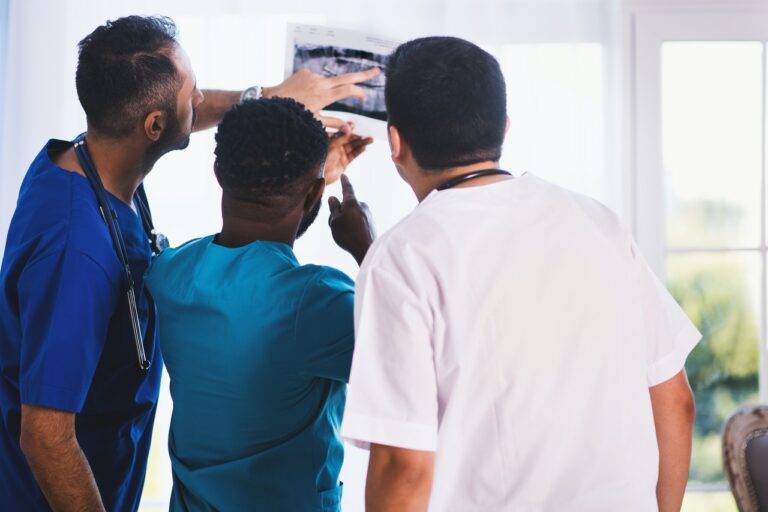 Doctors looking at an x-ray